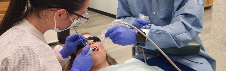 Dentists working on patient