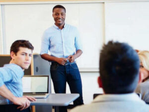 Teacher standing in front of a classroom of students